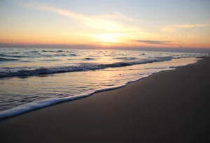 Serene beach scene at sunset representing peace and remembrance